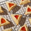 <p>These shortbread-like cookies filled with jam are traditionally served around the Jewish holiday of Purim.</p><p><em><a href="https://www.delish.com/cooking/recipe-ideas/a31959676/hamantaschen-recipe/" rel="nofollow noopener" target="_blank" data-ylk="slk:Get the recipe from Delish »;elm:context_link;itc:0;sec:content-canvas" class="link ">Get the recipe from Delish »</a></em></p>