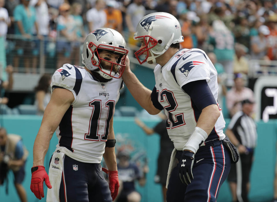 Julian Edelman, left, had a unique way of hyping up teammate Tom Brady during the AFC title game. (AP)