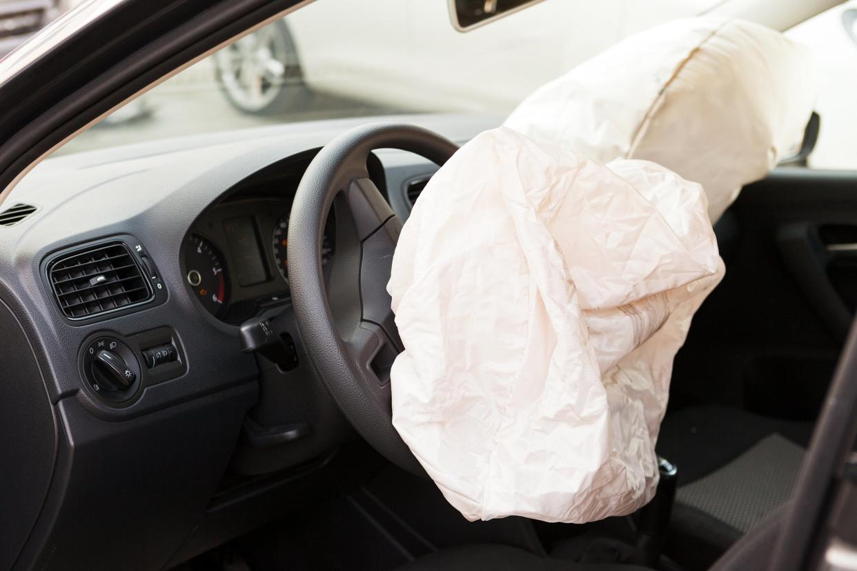 Deployed airbag in a car