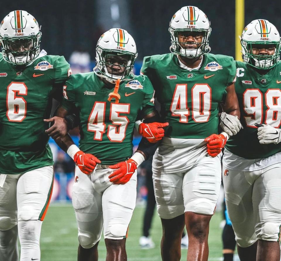 Florida A&M linebacker Nay'Ron Jenkins (45) walks interlocked with his Rattlers teammates before their 30-26 Celebration Bowl victory over the Howard Bison at Mercedes-Benz Stadium in Atlanta, Georgia, Saturday, Dec. 16, 2023.