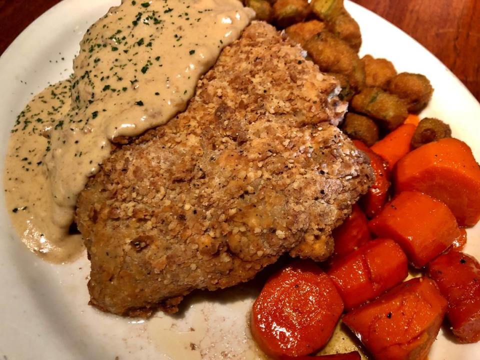 Chicken-fried steak with carrots and okra at Charleston’s.