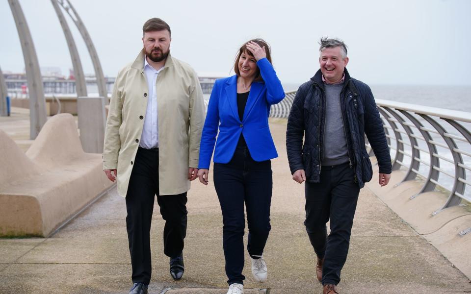 Rachel Reeves, the shadow chancellor, is pictured today in Blackpool with Chris Webb (left), the Labour candidate for the Blackpool South by-election, and Jonathan Ashworth (right), the shadow paymaster general