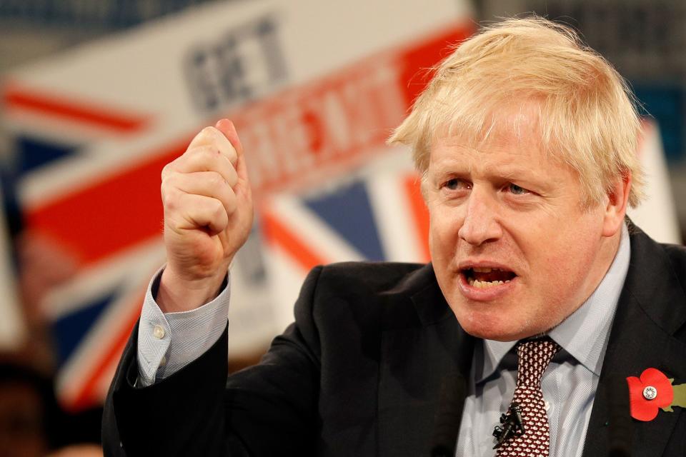 Britain's Prime Minister Boris Johnson speaks at the Conservative Party's General Election campaign launch, at the National Exhibition Centre (NEC) in Birmingham, central England, on November 6, 2019. - British Prime Minister Boris Johnson vowed Wednesday to get Brexit done by January and compared his Labour Party rival Jeremy Corbyn to Joseph Stalin in a strident launch to a tough pre-Christmas election campaign. The splintered country is entering its third general election in four years in search of a solution to a monumental crisis launched by the voters' decision in 2016 to file for a divorce from the European Union after nearly 50 years. (Photo by Adrian DENNIS / AFP) (Photo by ADRIAN DENNIS/AFP via Getty Images)