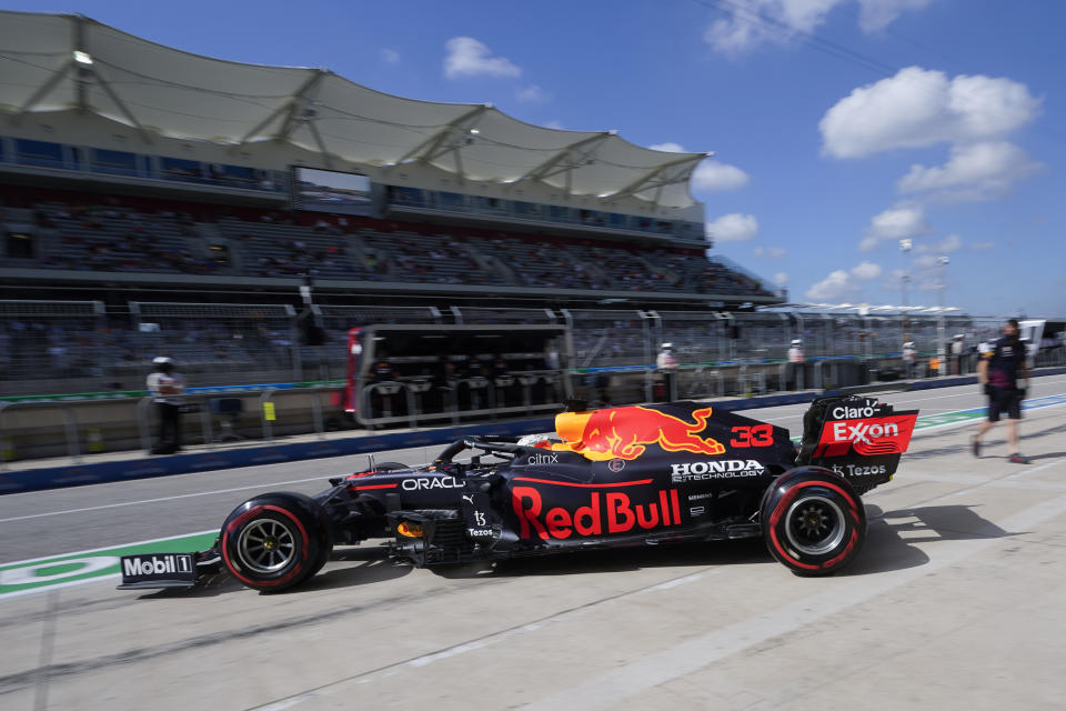 Red Bull driver Max Verstappen, of the Netherlands, pulls out of the pits during a practice session for the F1 US Grand Prix auto race at the Circuit of the Americas, Friday, Oct. 22, 2021, in Austin, Texas. (AP Photo/Darron Cummings)