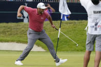 Jon Rahm, of Spain, pumps his fist after making his birdie putt on the 18th green during the final round of the U.S. Open Golf Championship, Sunday, June 20, 2021, at Torrey Pines Golf Course in San Diego. (AP Photo/Marcio Jose Sanchez)