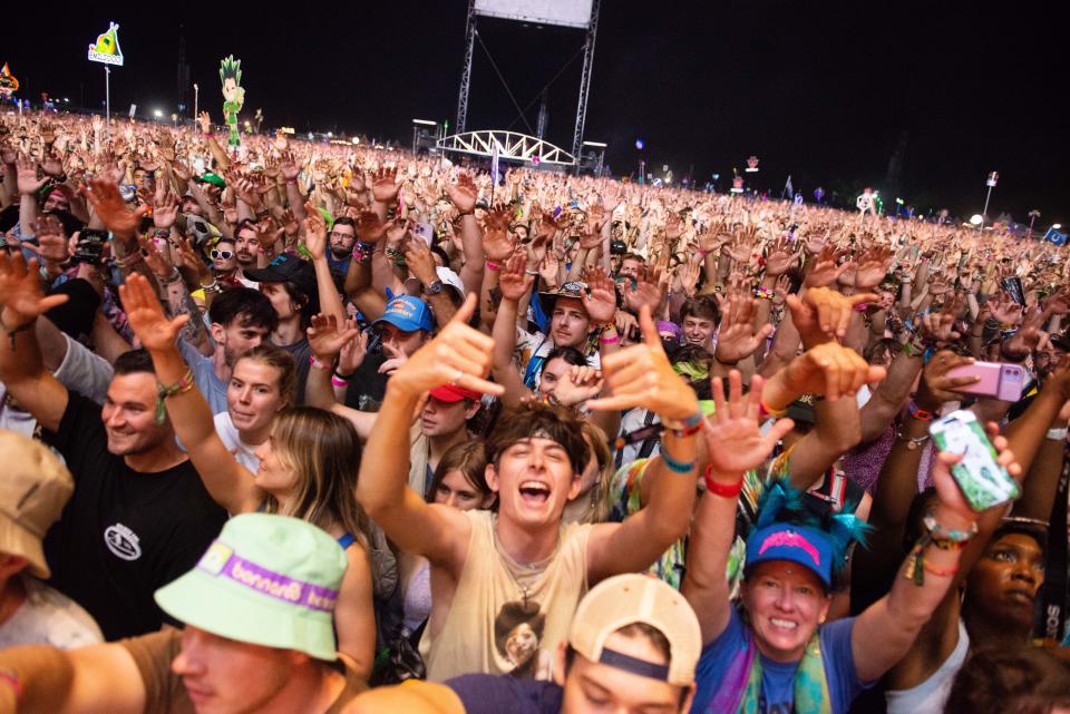 Bonnaroo attendees cheer as Kendrick Lamar performs during the second day of Bonnaroo Music Festival in Manchester, Tennessee
on Friday, Jun. 16, 2023.