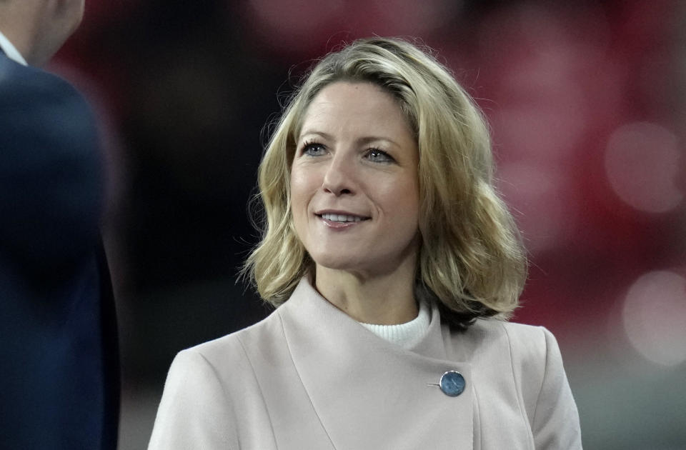 FILE - Jacqui Oatley of Britain's Sky Sports is working for the United States' Fox Sports as a touchline reporter during the women's friendly soccer match between England and the US at Wembley stadium in London, on Oct. 7, 2022. (AP Photo/Kirsty Wigglesworth, File)