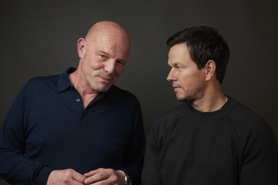 Director Simon Cellan Jones, left, poses with actor Mark Wahlberg in New York on Dec. 9, 2023, to promote their film "The Family Plan." (Photo by Matt Licari/Invision/AP)