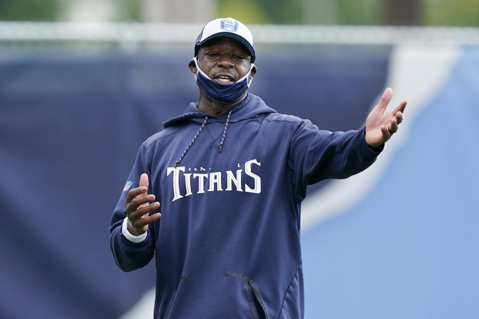 FILE - Tennessee Titans running backs coach Tony Dews leads a drill during NFL football training camp, Aug. 16, 2020, in Nashville, Tenn. Two-time NFL rushing champ Derrick Henry absolutely believes his position coach Tony Dews would make a great head coach in the NFL. (AP Photo/Mark Humphrey, File)