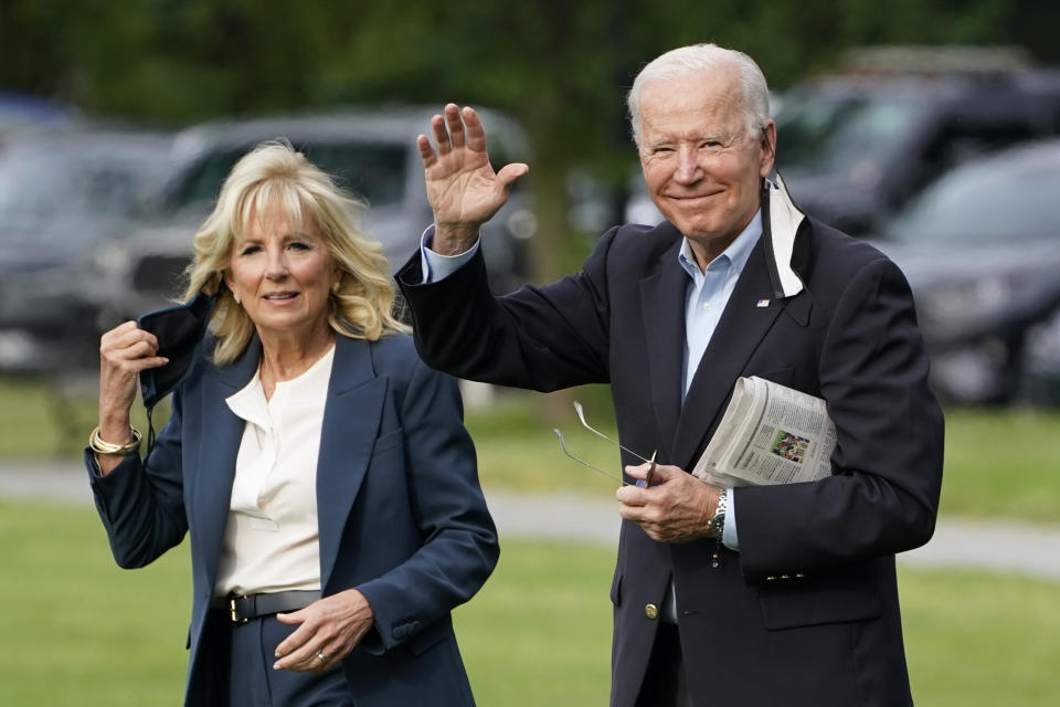 FILE - President Joe Biden and first lady Jill Biden walk to board Marine One for his first international trip as President, on June 9, 2021, in Washington. (AP Photo/Evan Vucci, File)