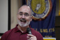 United Auto Workers President Shawn Fain speaks to Volkswagen auto workers Friday, April 19, 2024, in Chattanooga, Tenn., after workers at a VW factory voted to join the UAW. (AP Photo/George Walker IV)