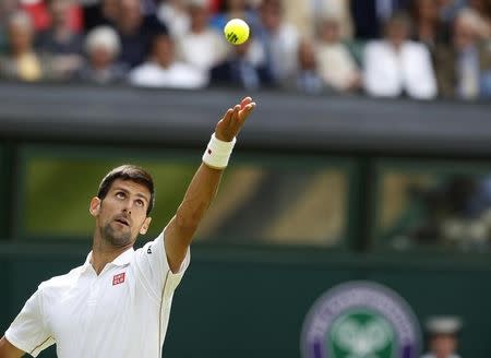 Britain Tennis - Wimbledon - All England Lawn Tennis & Croquet Club, Wimbledon, England - 27/6/16 Serbia's Novak Djokovic in action against Great Britain's James Ward REUTERS/Paul Childs