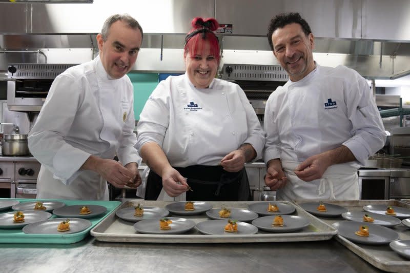 Air France held a tasting dinner for its new menu designed by Master Chef Olivier Perret (L) at the 25th annual Montréal en Lumière festival in February. Photo courtesy of Montréal en Lumière
