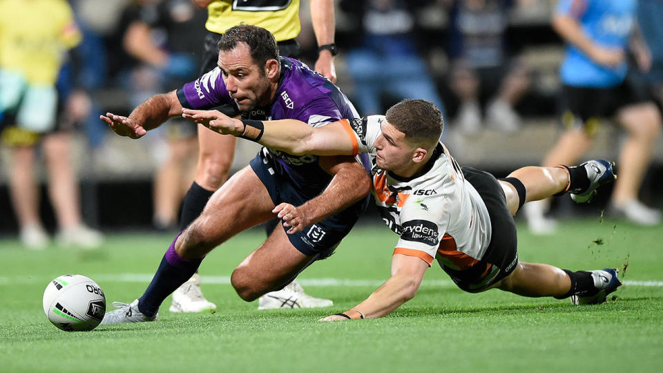 Pictured here, Cam Smith touches down for a try against the Wests Tigers.