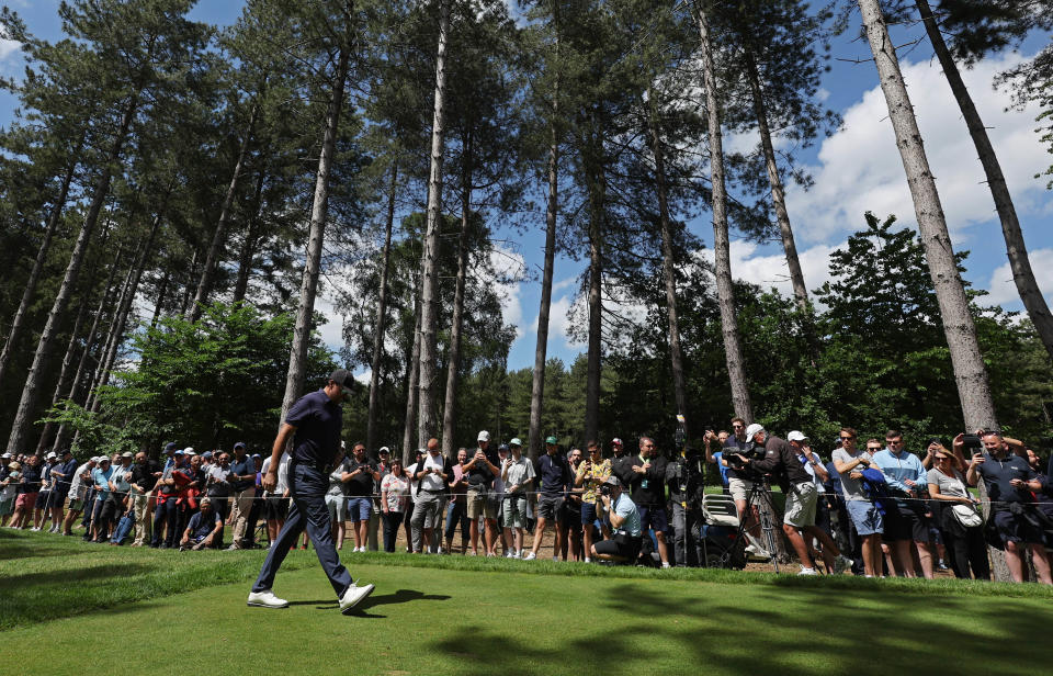 Phil Mickelson walks off a tee box during the second round of the inaugural LIV Golf tournament.