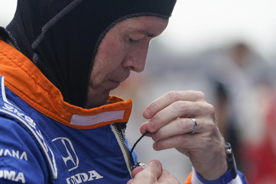 Scott Dixon, of New Zealand, prepares to drive during a practice session for the IndyCar auto race at Indianapolis Motor Speedway, Friday, Aug. 13, 2021, in Indianapolis. (AP Photo/Darron Cummings)
