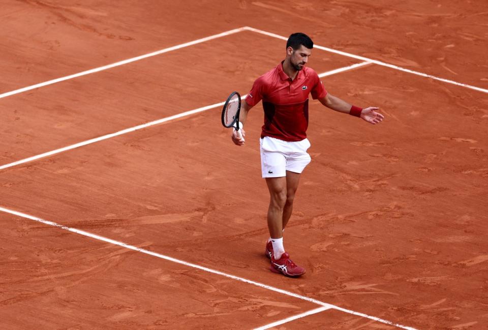 Novak Djokovic suffered a knee injury at Roland Garros (REUTERS)