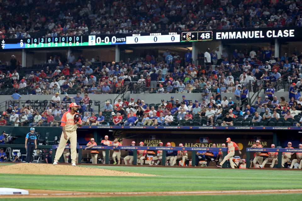 Emmanuel Clase of the Cleveland Guardians gets set to throw a ninth-inning pitch during the MLB All-Star game, July 16, 2024, in Arlington, Texas.