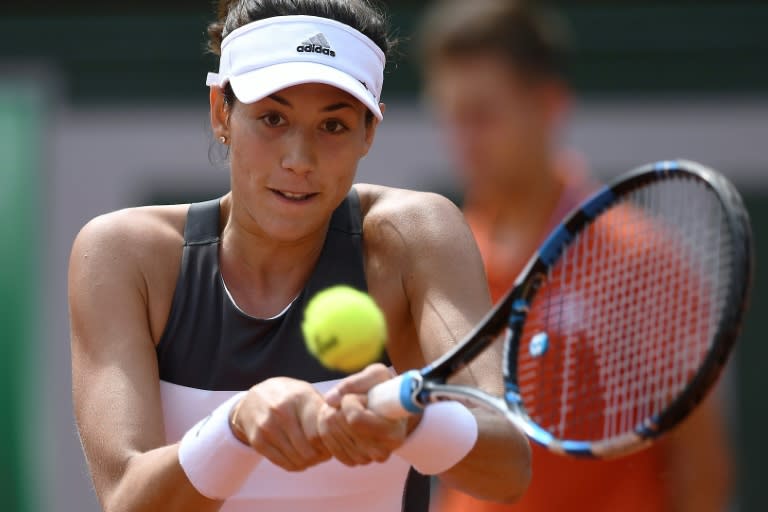 Spain's Garbine Muguruza in action during her French Open first round match against Italy's Francesca Schiavone in paris, on May 29, 2017