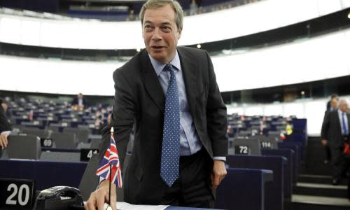 Former UK Independence Party leader and member of the European Parliament, Nigel Farage, places Britain's Union Jack flag upon his arrival at the Parliament in Strasbourg, eastern France, Wednesday, Sept. 13, 2017. European Commission President Jean-Claude Juncker addressed the members of the European Parliament to outline his reform plans for the European Union in the so-called State of the Union debate. Juncker said the European Union is 