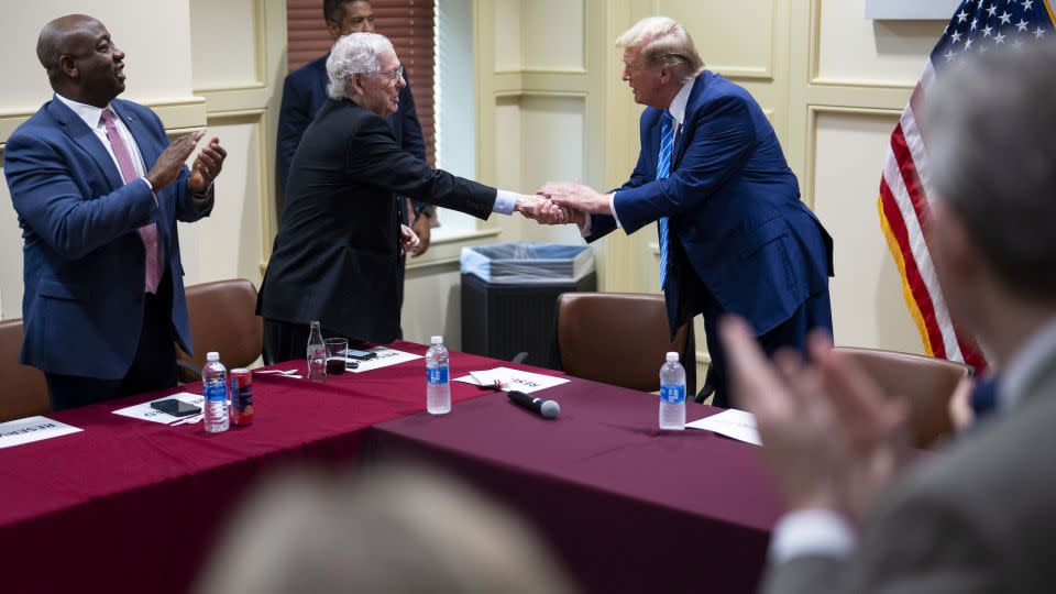 Former President Donald Trump shakes hands with Senate Minority Leader Mitch McConnell as he arrives to meet with GOP lawmakers at the National Republican Senatorial Committee headquarters in Washington on June 13, 2024. - Doug Mills/The New York Times/Redux