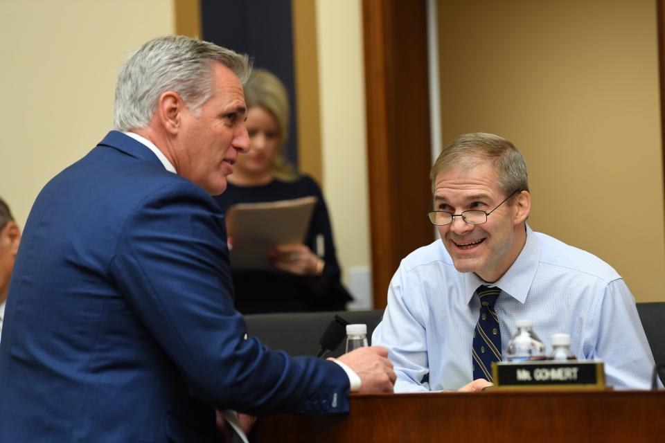 House Majority Leader Kevin McCarthy of Calif., left, and Rep. Jim Jordan, R-Ohio, talke before hearing testimony from Google CEO Sundar Pichai at a hearing before the House Judiciary Committee, Tuesday, Dec. 11, 2018, in Washington. [Via MerlinFTP Drop]