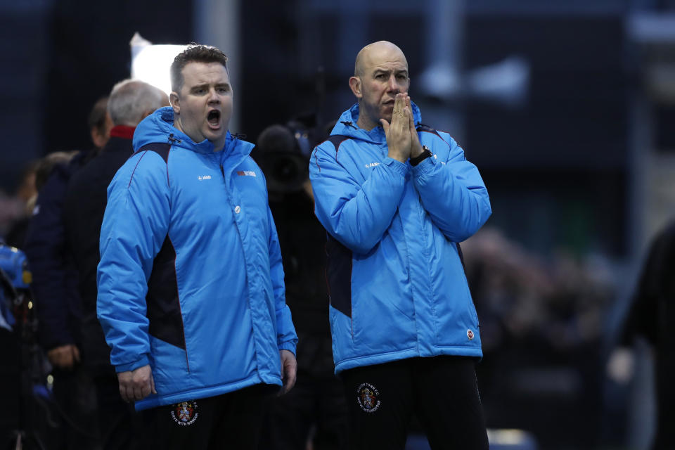 SLOUGH, ENGLAND - DECEMBER 02: Neil Baker and Jon Underwood managers of Slough Town look on during the Emirates FA Cup Second Round match between Slough Town and Gillingham at Arbour Park on December 02, 2018 in Slough, England. (Photo by Luke Walker/Getty Images)