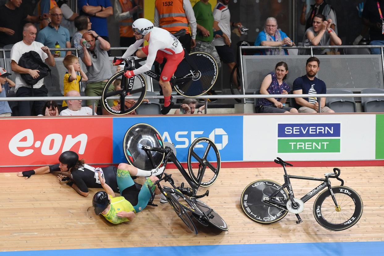 Matt Walls (top) of England, George Jackson (L) of New Zealand and Joshua Duffy (R) of Australia crash during the Men's 15km Scratch Race on Day 3 of the XXII Commonwealth Games at the Lee Valley VeloPark in Birmingham, Britain, 31 July 2022. 2022 Commonwealth Games - Day 3, Birmingham, United Kingdom - 31 Jul 2022