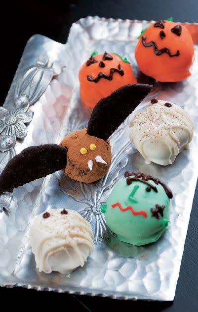 <p>Let your imagination fly when you start decorating these truffles. You can decorate them as your favorite Halloween monsters.<a href="https://www.womansday.com/food-recipes/food-drinks/a28859104/bewitching-candy-truffles-recipe/" rel="nofollow noopener" target="_blank" data-ylk="slk:;elm:context_link;itc:0;sec:content-canvas" class="link "><br></a></p><p><strong><em><a href="https://www.womansday.com/food-recipes/food-drinks/a28859104/bewitching-candy-truffles-recipe/" rel="nofollow noopener" target="_blank" data-ylk="slk:Get the Bewitching Candy Truffles recipe.;elm:context_link;itc:0;sec:content-canvas" class="link ">Get the Bewitching Candy Truffles recipe. </a></em></strong></p>