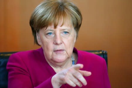 German Chancellor Angela Merkel gestures as she attends the weekly cabinet meeting at the chancellery in Berlin, Germany, April 18, 2018. REUTERS/Hannibal Hanschke