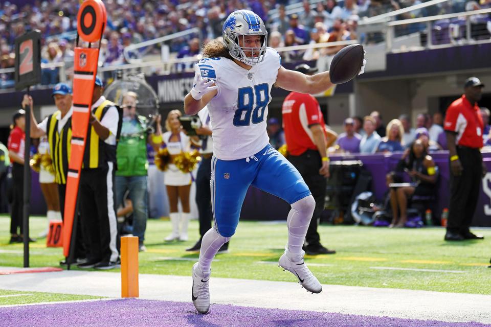 Lions tight end T.J. Hockenson reacts as he scores on a pass reception in the second quarter against the Vikings on Sunday, Sept. 25, 2022, in Minneapolis.