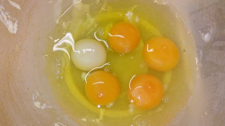 egg yolks with one paler