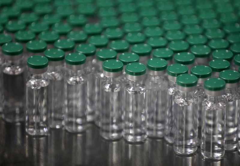 FILE PHOTO: Vials of AstraZeneca's COVISHIELD, coronavirus disease (COVID-19) vaccine, are seen before they are packaged inside a lab at Serum Institute of India, Pune