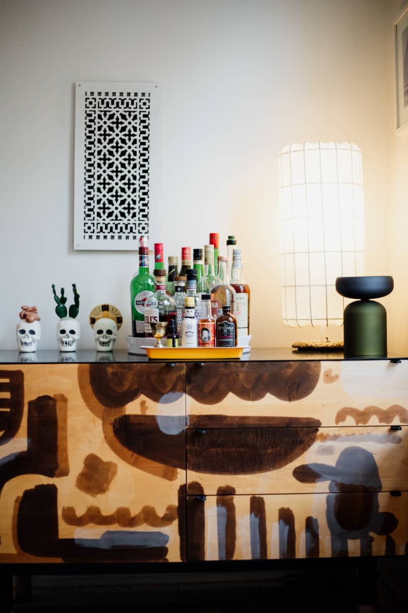 Home bar on wooden credenza.