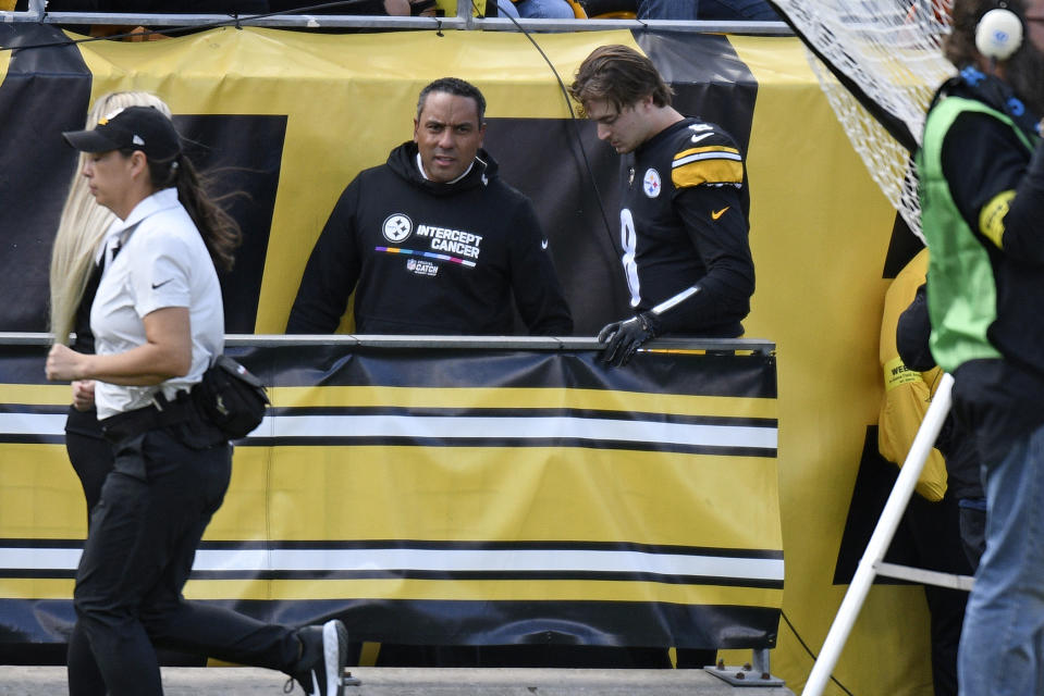 Pittsburgh Steelers quarterback Kenny Pickett (8) heads for the locker room after being injured during the second half of an NFL football game against the Tampa Bay Buccaneers in Pittsburgh, Sunday, Oct. 16, 2022. (AP Photo/Don Wright)