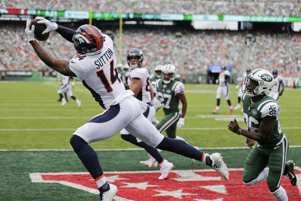 Denver Broncos' Courtland Sutton (14) catches a pass for a touchdown during the first half of an NFL football game against the New York Jets Sunday, Oct. 7, 2018, in East Rutherford, N.J. (AP Photo/Seth Wenig)