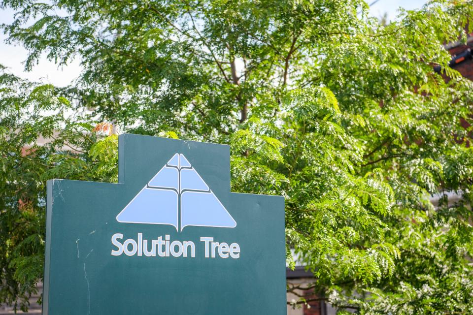 The Solution Tree sign at the parking lot near 555 North Morton Street on June 24, 2022.