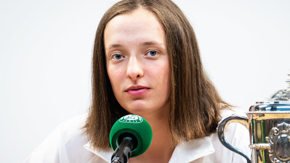 Iga Swiatek, pictured here speaking to reporters after winning the French Open.