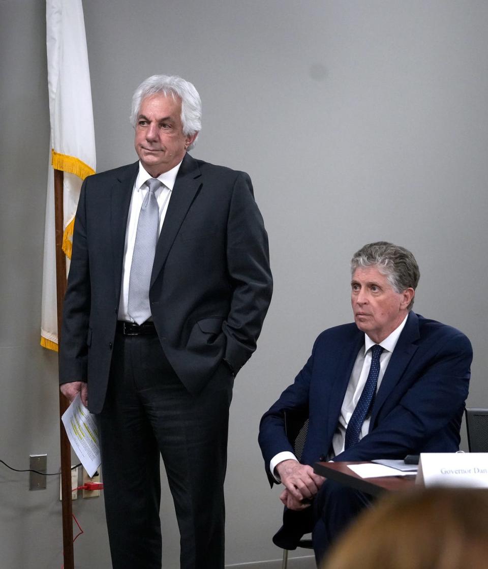 Department of Transportation Director Peter Alviti Jr., left, and Gov. Dan McKee during Thursday's news conference at the Department of Administration building talk about the demolition of the old and rebuilding of a new Washington Bridge.