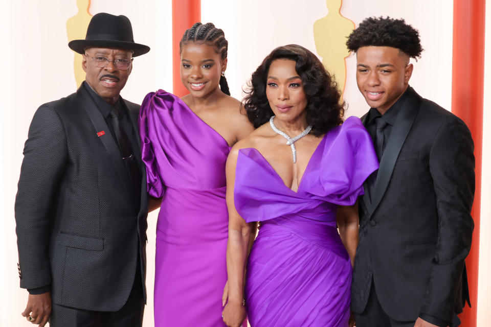 HOLLYWOOD, CALIFORNIA - MARCH 12: (L-R) Courtney B. Vance, Bronwyn Golden Vance, Angela Bassett and Slater Josiah Vance attend the 95th Annual Academy Awards on March 12, 2023 in Hollywood, California. (Photo by Kayla Oaddams/WireImage )