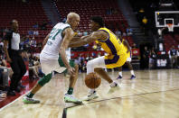 Boston Celtics forward Jordan Walsh (27) is fouled by Los Angeles Lakers guard Max Christie (10) during the second half of NBA summer league basketball game Wednesday, July 12, 2023, in Las Vegas. (Steve Marcus/Las Vegas Sun via AP)
