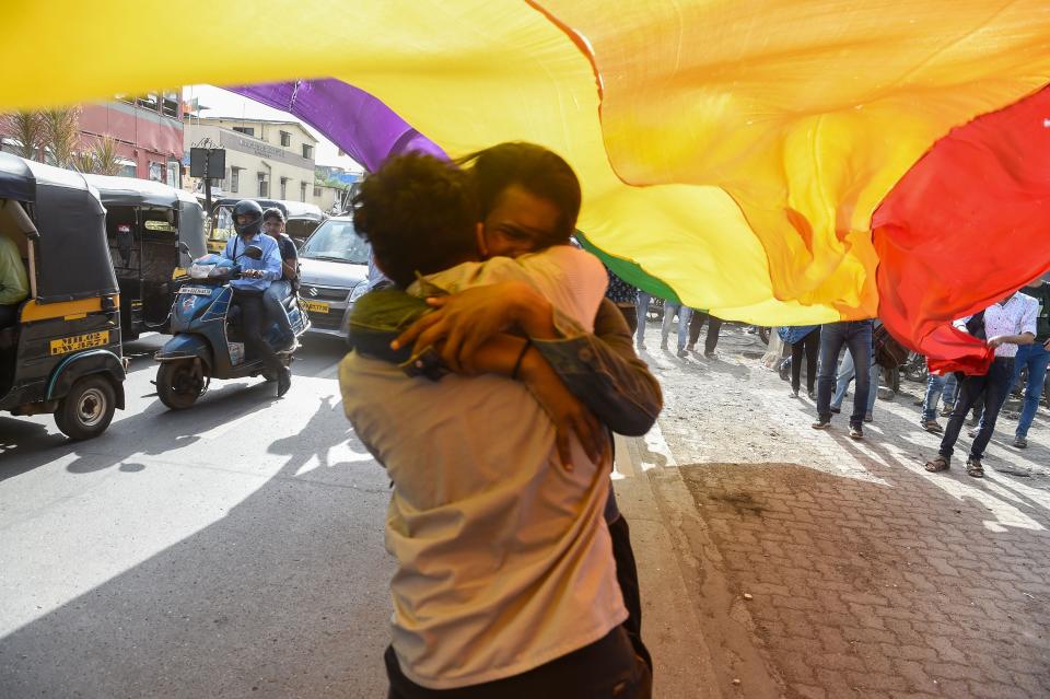 Members and supporters of the LGBTQ community in Mumbai celebrate the Indian supreme court decision to strike down a colonial-era ban on same-sex relations on Sep. 6, 2018.<span class="copyright">Indranil Mukherjee/ AFP via Getty Images</span>