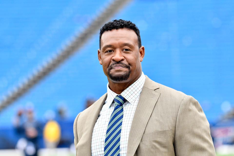 New England Patriots former player and current NFL Network analyst Willie McGinest on the field prior to a game between the Buffalo Bills and the New England Patriots at New Era Field.