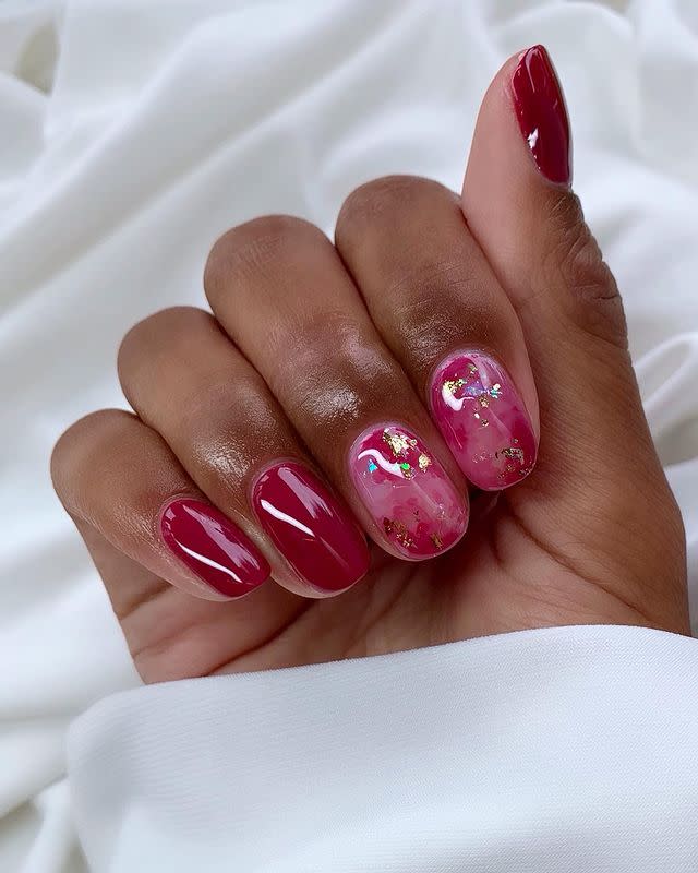 <p>A mix of cherry-red polish and a sprinkle of gold sparkle is our fave festive combo. </p><p><a href="https://www.instagram.com/p/CDewZYLJyVN/" rel="nofollow noopener" target="_blank" data-ylk="slk:See the original post on Instagram;elm:context_link;itc:0;sec:content-canvas" class="link ">See the original post on Instagram</a></p>