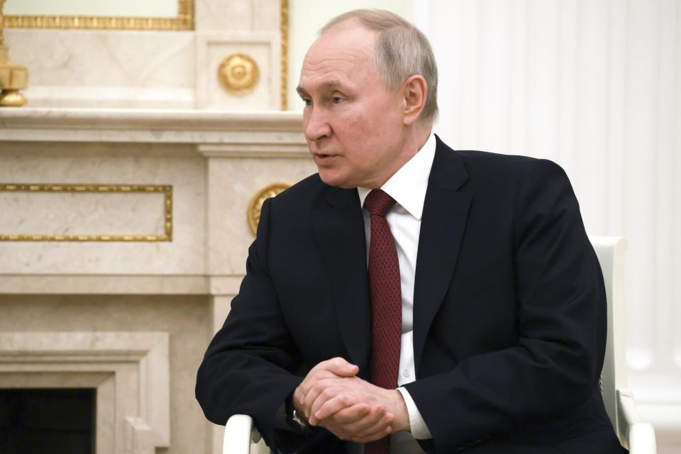 Russian President Vladimir Putin speaks to Syrian President Bashar Assad during their meeting at the Kremlin in Moscow, Russia, Wednesday, March 15, 2023. (Vladimir Gerdo, Sputnik, Kremlin Pool Photo via AP)