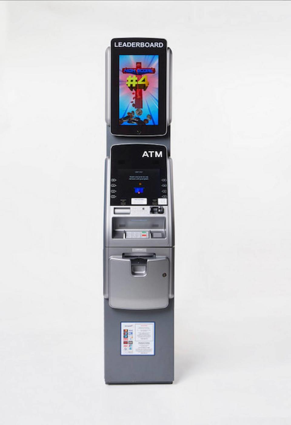 “ATM Leaderboard” by the art collective MSCHF, a fully-stocked ATM that displays users’ wealth, is on display at Art Basel on Miami Beach.