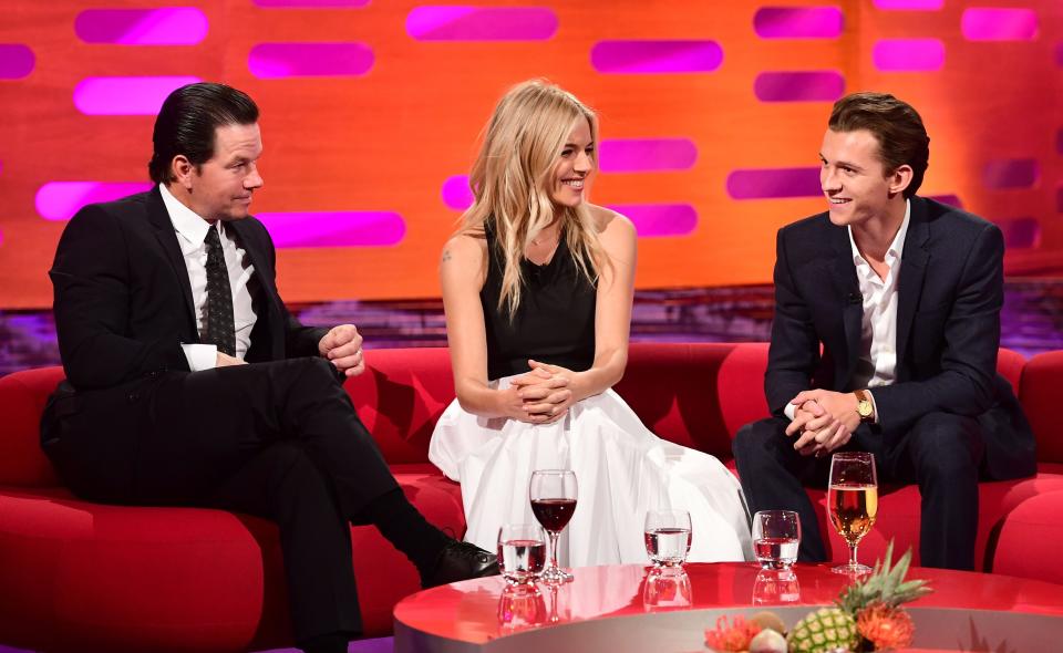 (left to right) Mark Wahlberg, Sienna Miller and Tom Holland during filming of the Graham Norton Show at the London Studios, to be aired on BBC One on Friday evening. (Photo by Ian West/PA Images via Getty Images)