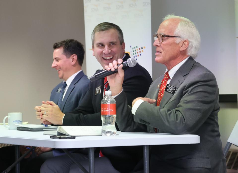 Republican leaders in the South Dakota Legislature share a light moment during a January 2023 press conference in Pierre. They are, left to right: Rep. Will Mortenson, Sen. Casey Crabtree and Sen. Michael Diedrich.