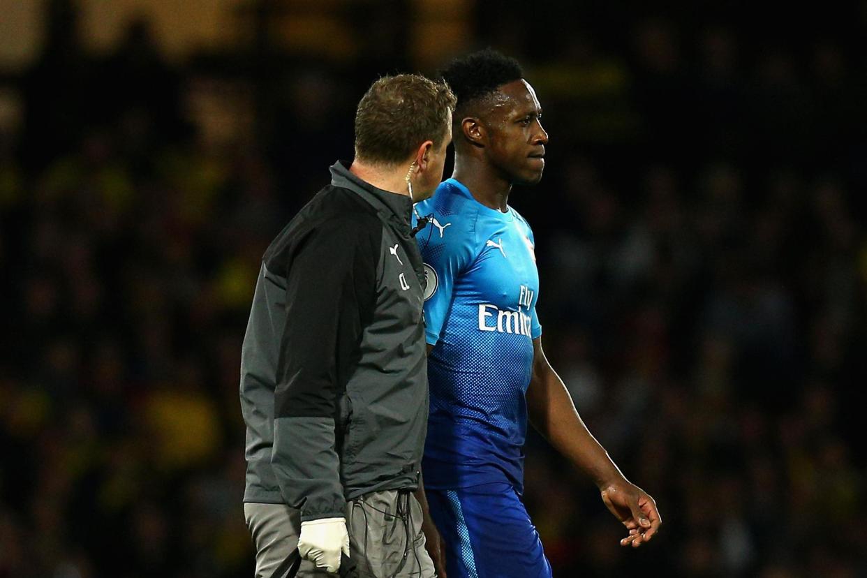 Injury woes: Welbeck limped out of Arsenal's defeat at Watford: Getty Images