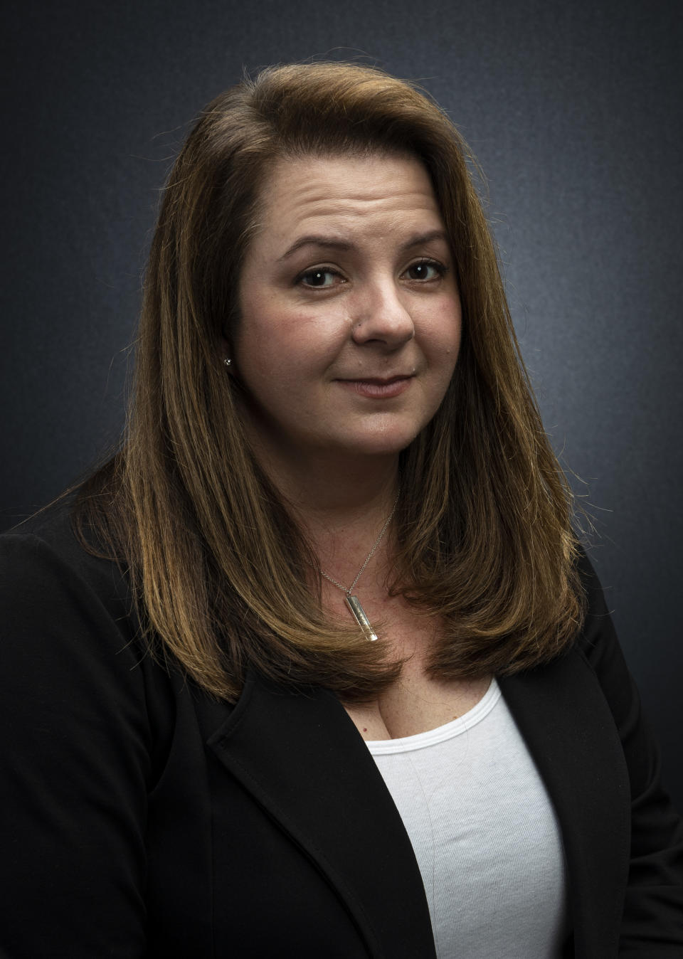 This March 16, 2020 photo shows event producer Heather Hope-Allison posing for a portrait in Los Angeles. Earlier this month, Hope-Allison and her husband, Steve were putting together the schedule for the ninth season of Street Food Cinema, a six-month series of events in the Los Angeles area featuring film indoor and outdoor screenings, food trucks and musical acts. But when Los Angeles Mayor Eric Garcetti announced a citywide "Safer At Home" order, shutting down all nonessential businesses due to the coronavirus, it became unclear whether she would be hosting any kind of season at all. (Photo by Willy Sanjuan/Invision/AP)